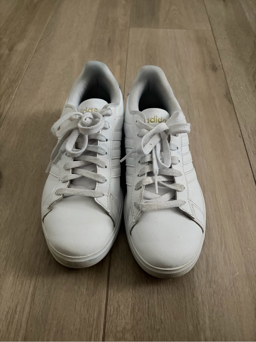 adidas Women’s White Leather Low-Top Sneakers with Gold Logo